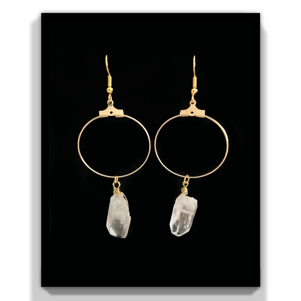 Gold hoop earrings with dangling raw Clear Quartz